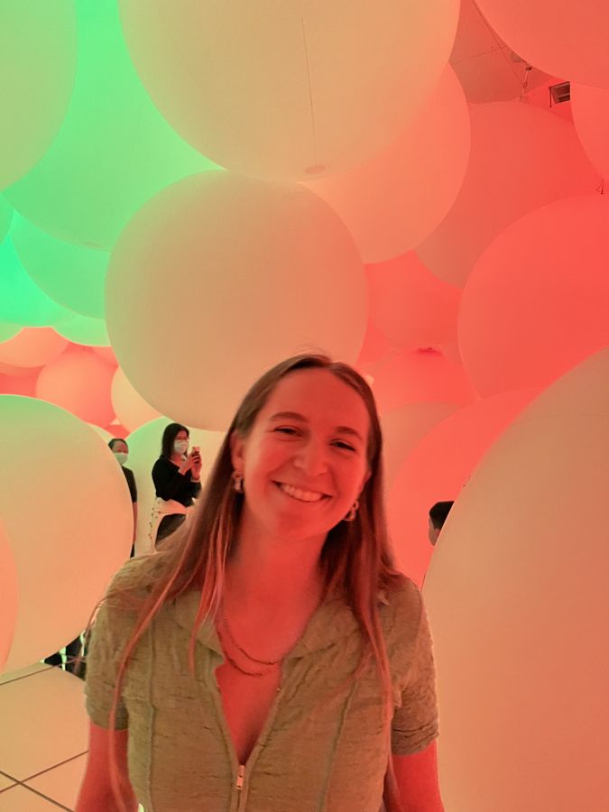 Jojo surrounded by giant balloons